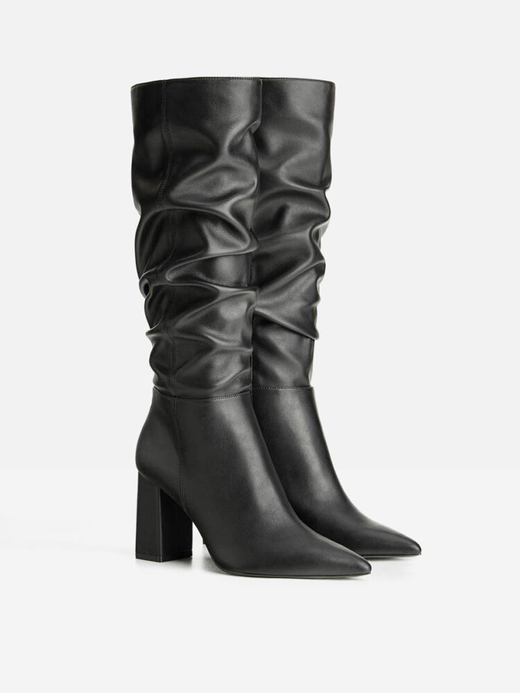 High-heeled boots with a wide upper